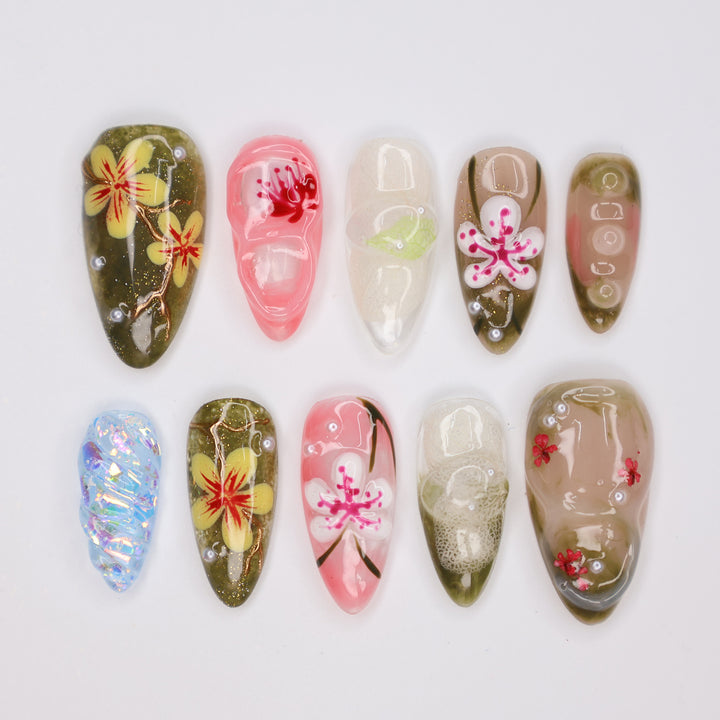 Handmade Tropical Floral Press-On Nails – Spring Collection-  earthy green, soft pink, and translucent tones with 3D flowers, pearl accents, and shimmer. Perfect for vacations, beach days, or as a unique gift for her.