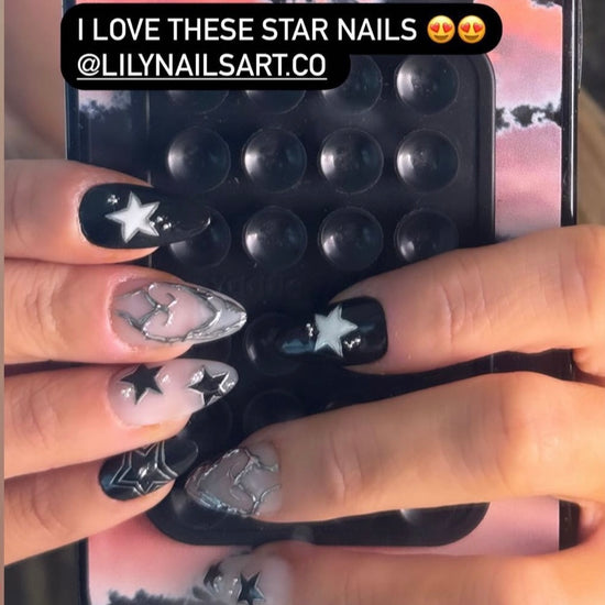 Handmade Black and White Starry Night Press-On Nails – celestial theme with silver stars, heart accents, and modern abstract details. Perfect for holidays, birthdays, vacations, or as a unique gift for her.