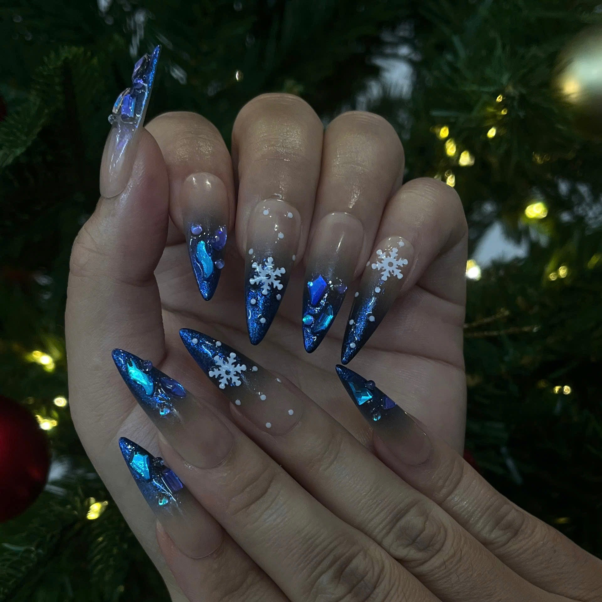 Handmade Winter Snowflake Press-On Nails – blue glitter, snowflake details, and crystal accents. Perfect for holidays, birthdays, vacations, or as a festive gift for her