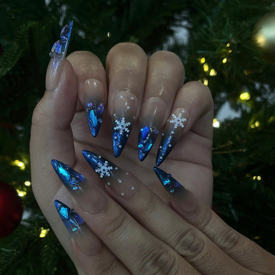 Handmade Winter Snowflake Press-On Nails – blue glitter, snowflake details, and crystal accents. Perfect for holidays, birthdays, vacations, or as a festive gift for her