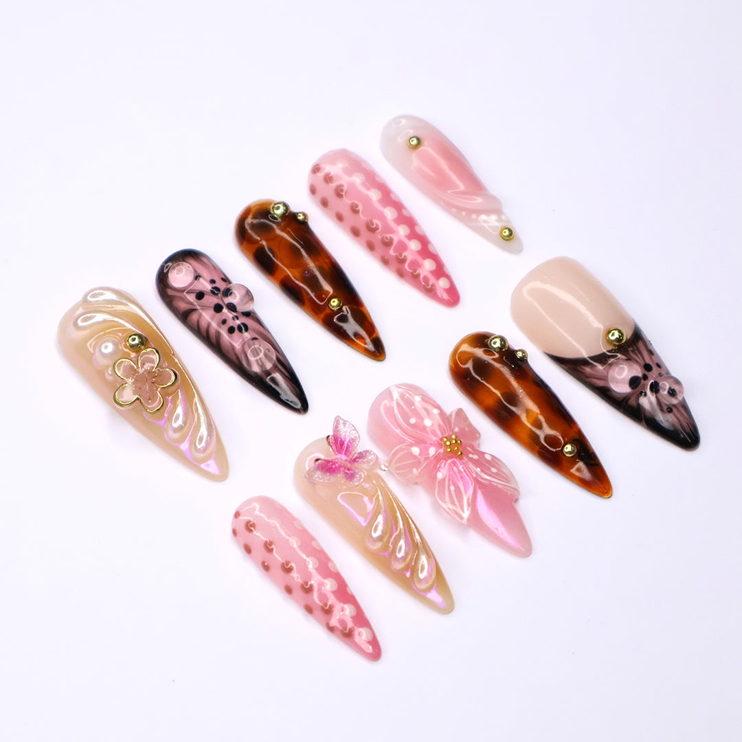 Handmade Tortoise & Pink Press-On Nails- Fall Collection – nude, pink, and tortoiseshell tones with 3D flowers, butterflies, and gold accents. Perfect for birthdays, holidays vacation, or as a thoughtful gift for her