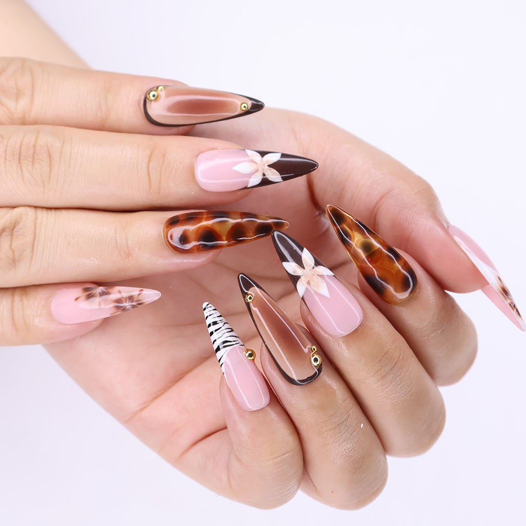 Handmade Tortoise & Zebra Press-On Nails – Fall Collection nude pink tones with tortoiseshell accents, zebra stripes, and delicate 3D floral designs. Perfect for everyday wear, events, holiday, vacation or as a stylish gift for her