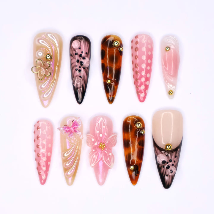 Handmade Tortoise & Pink Press-On Nails- Fall Collection – nude, pink, and tortoiseshell tones with 3D flowers, butterflies, and gold accents. Perfect for birthdays, holidays vacation, or as a thoughtful gift for her