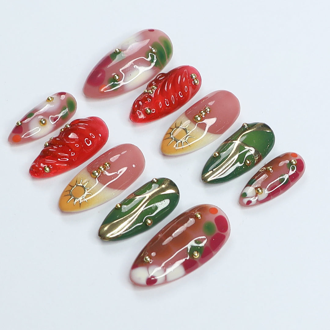 Handmade Press-On Nails with vibrant red, green, and gold designs, featuring intricate details and glossy finishes. Perfect for holidays, birthdays, vacations, or as a unique gift for her.