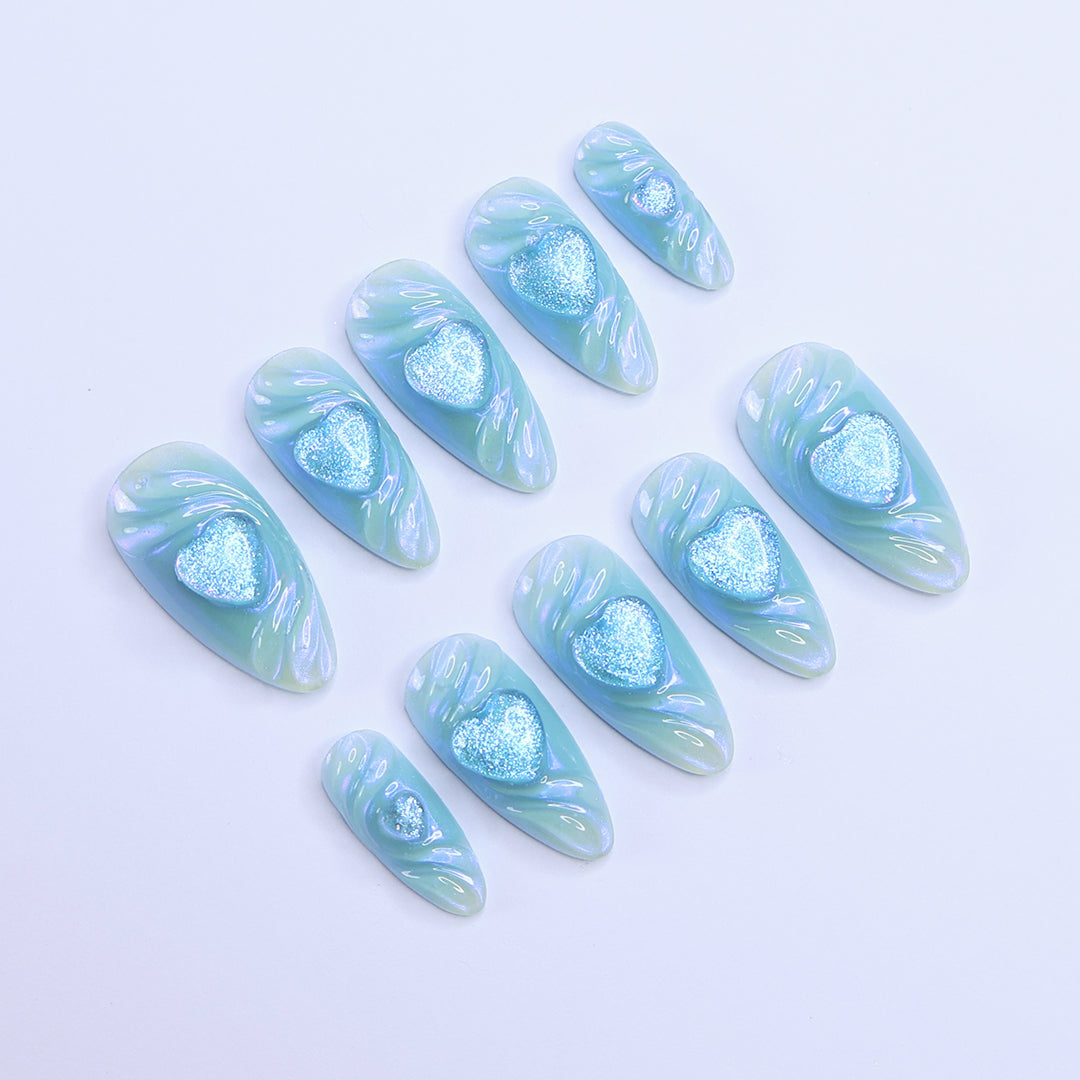 Handmade Blue Heart Press-On Nails – Valetine Collection - soft blue tones with shimmering 3D heart accents. Perfect for birthdays, holidays, anniversaries, or as a thoughtful gift for her.