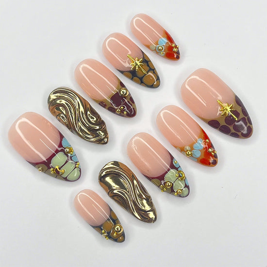 Handmade Luxe Mosaic Press-On Nails – nude tones with gold chrome accents, mosaic patterns, and star details. Perfect for holidays, birthdays, vacations, or as a luxurious gift for her.