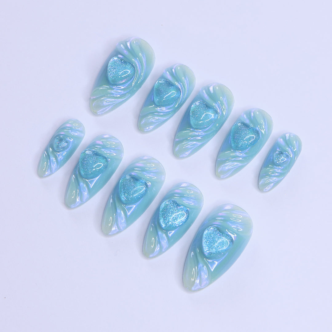 Handmade Blue Heart Press-On Nails – Valetine Collection - soft blue tones with shimmering 3D heart accents. Perfect for birthdays, holidays, anniversaries, or as a thoughtful gift for her.