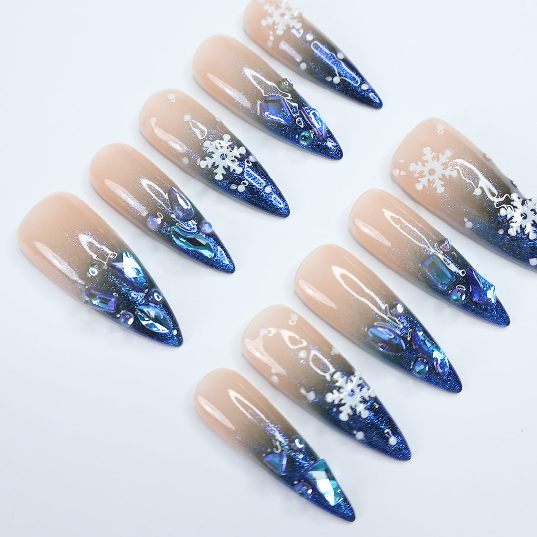 Handmade Winter Snowflake Press-On Nails – blue glitter, snowflake details, and crystal accents. Perfect for holidays, birthdays, vacations, or as a festive gift for her