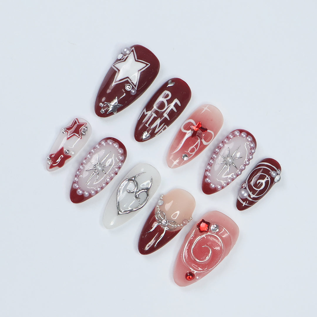 Be Mine Valentine's Day Press-On Nails – Elegant red and pink designs featuring hearts, stars, pearls, and romantic accents, perfect for holidays, birthdays, or vacations