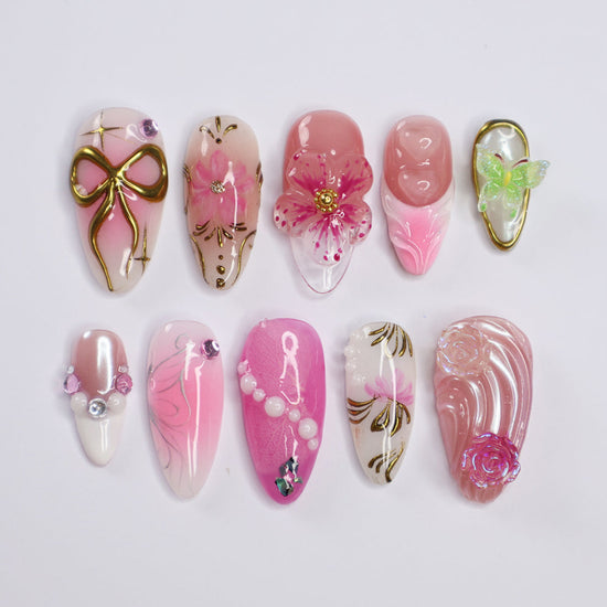 Handmade Pink Floral Press-On Nails – Spring Collection soft pink tones with 3D flowers, pearls, gold accents, and a waterproof-tested finish. Perfect for birthdays, holidays, vacations, or as a thoughtful gift for her. 