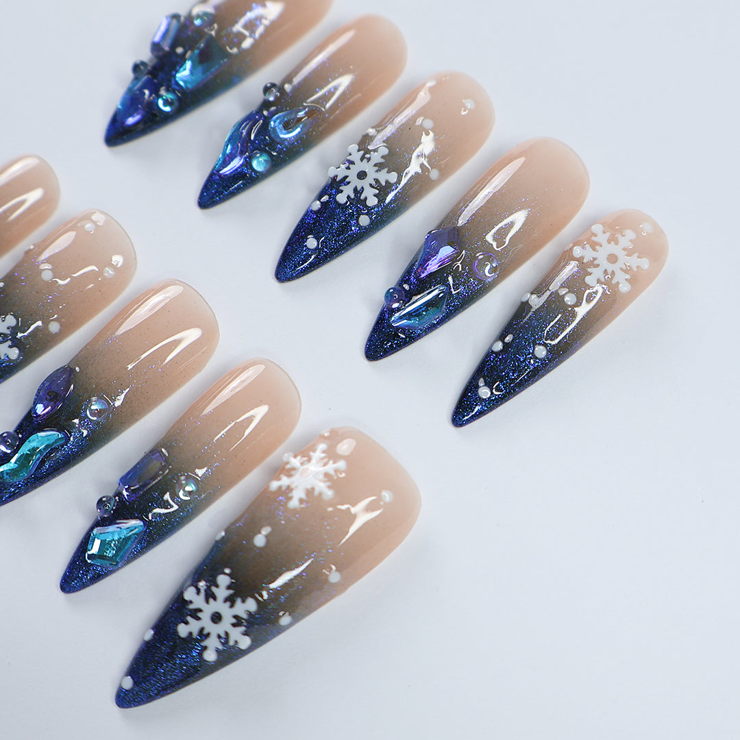 Handmade Winter Snowflake Press-On Nails – blue glitter, snowflake details, and crystal accents. Perfect for holidays, birthdays, vacations, or as a festive gift for her