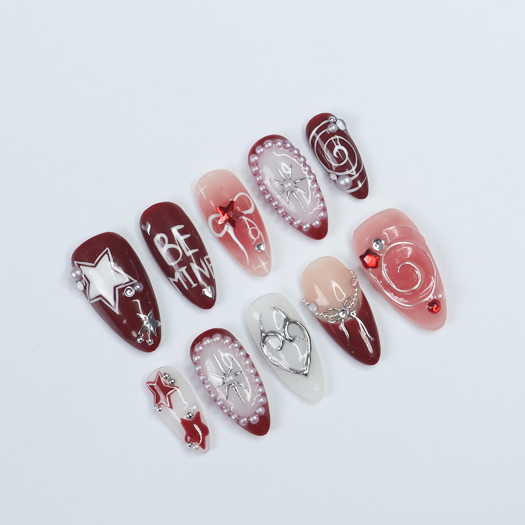 Be Mine Valentine's Day Press-On Nails – Elegant red and pink designs featuring hearts, stars, pearls, and romantic accents, perfect for holidays, birthdays, or vacations