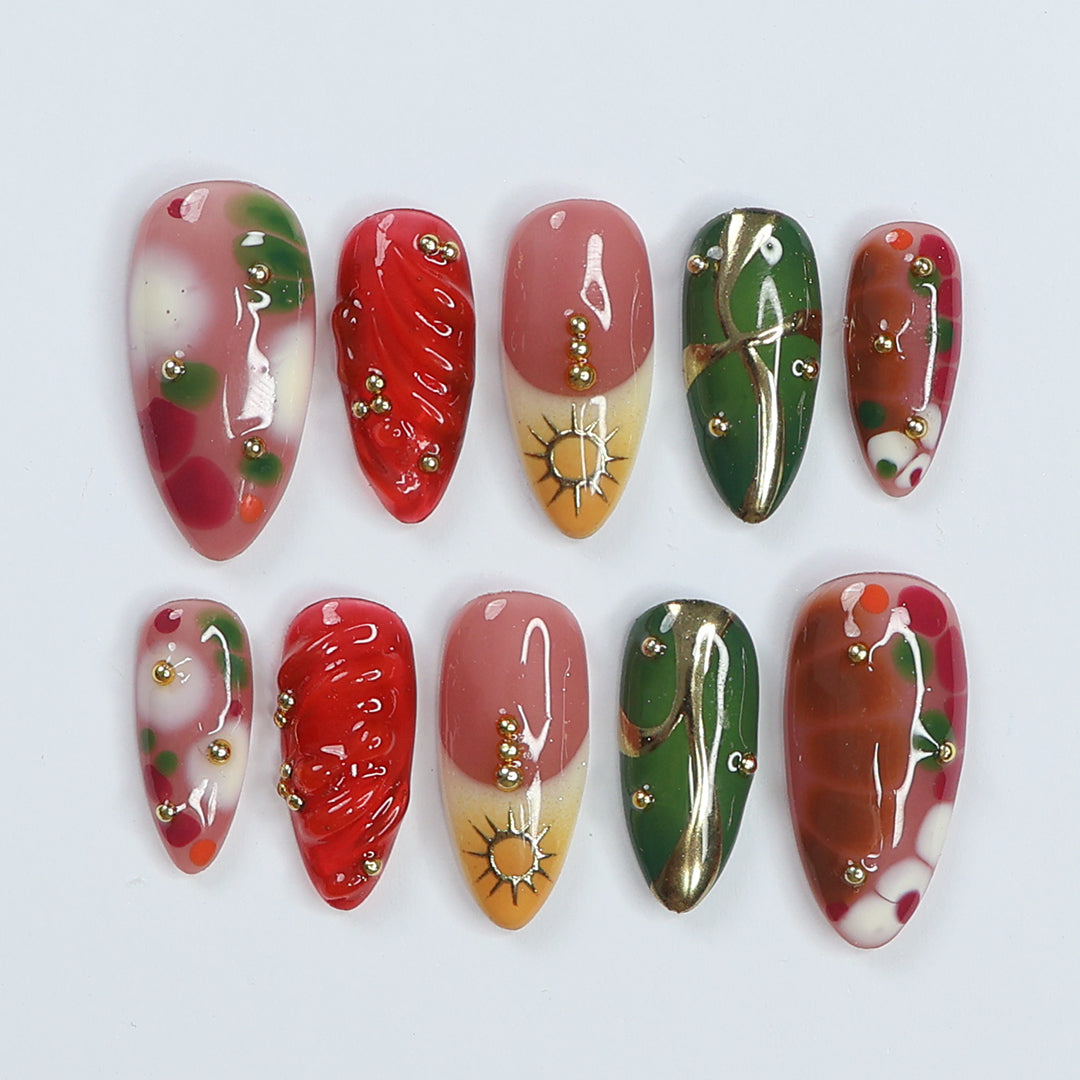 Handmade Press-On Nails with vibrant red, green, and gold designs, featuring intricate details and glossy finishes. Perfect for holidays, birthdays, vacations, or as a unique gift for her.