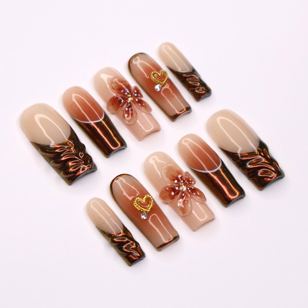 Amber Bloom Handmade Press-On Nails – elegant amber tones with 3D floral accents, shimmering details, and a glossy finish. Perfect for holidays, birthdays, vacations, or as a thoughtful gift for her.