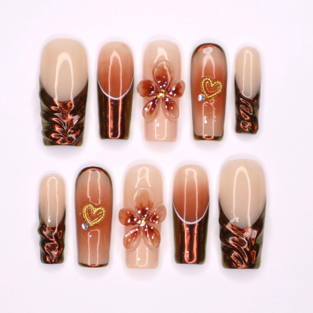 Amber Bloom Handmade Press-On Nails – elegant amber tones with 3D floral accents, shimmering details, and a glossy finish. Perfect for holidays, birthdays, vacations, or as a thoughtful gift for her.