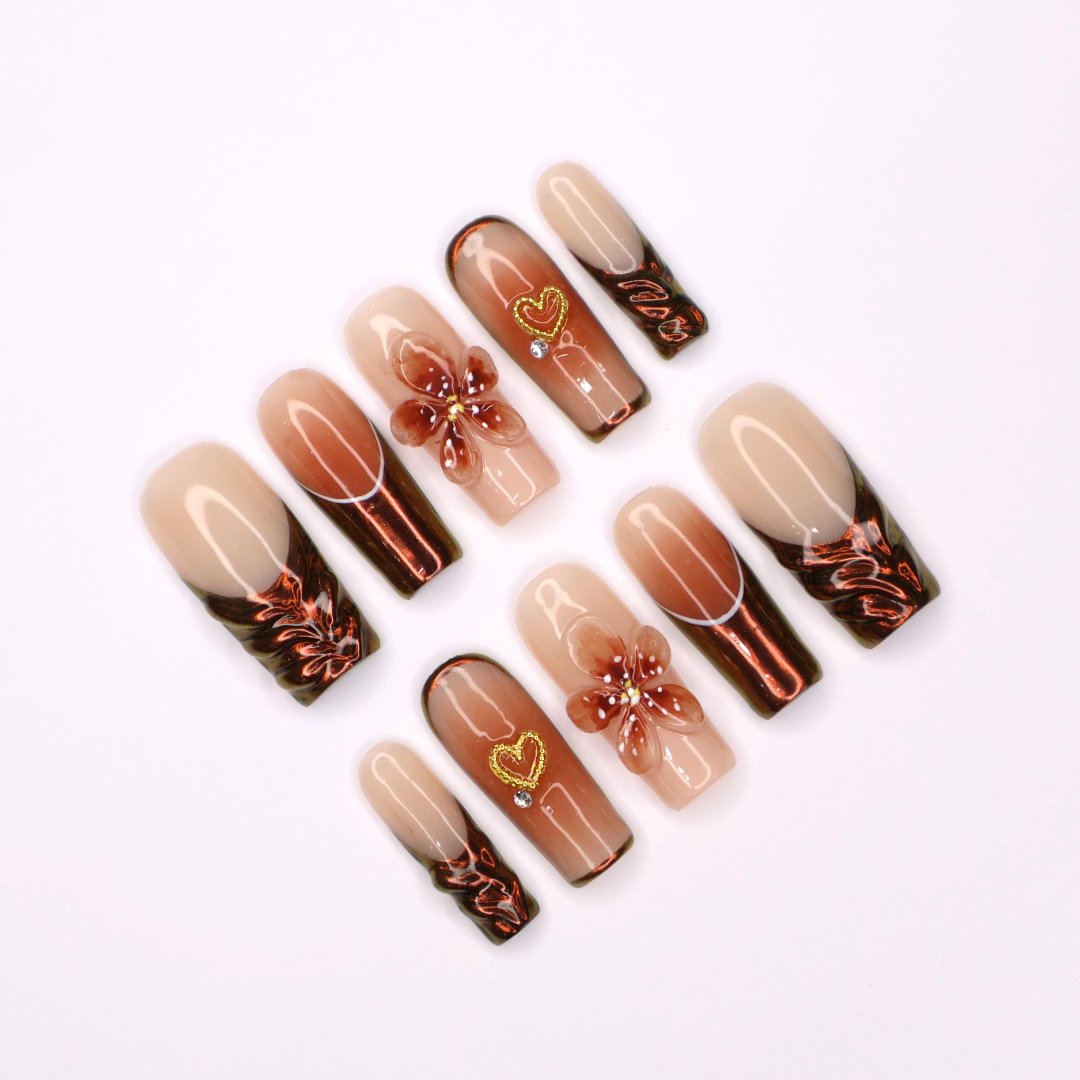 Amber Bloom Handmade Press-On Nails – elegant amber tones with 3D floral accents, shimmering details, and a glossy finish. Perfect for holidays, birthdays, vacations, or as a thoughtful gift for her.