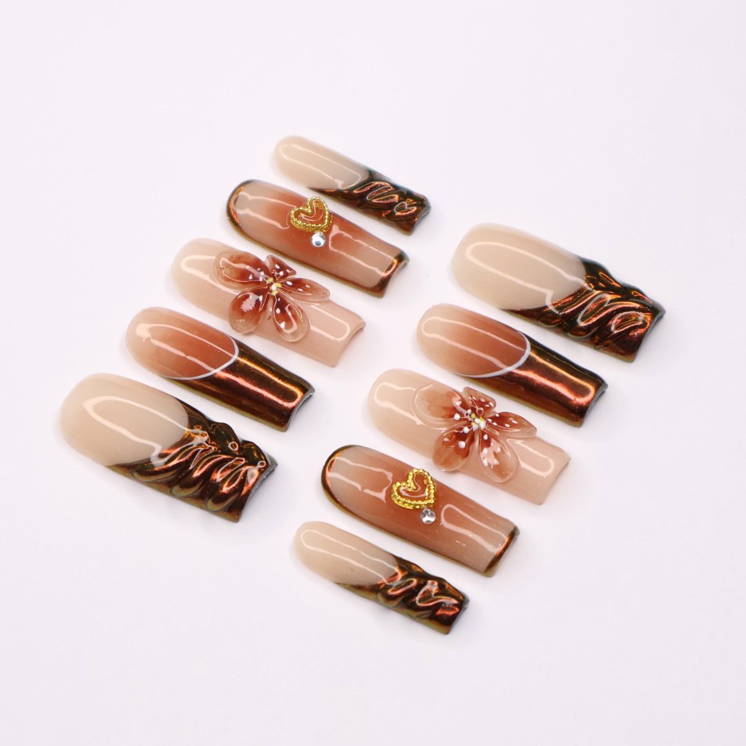 Amber Bloom Handmade Press-On Nails – elegant amber tones with 3D floral accents, shimmering details, and a glossy finish. Perfect for holidays, birthdays, vacations, or as a thoughtful gift for her.